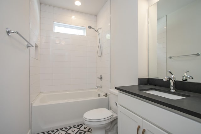 full bath featuring toilet, washtub / shower combination, and vanity