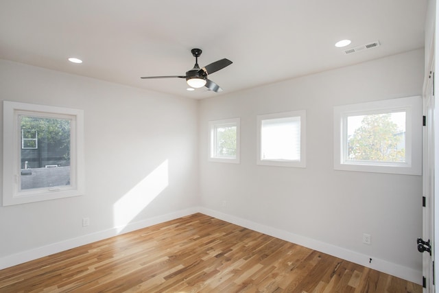 empty room with ceiling fan, light wood-style flooring, recessed lighting, visible vents, and baseboards