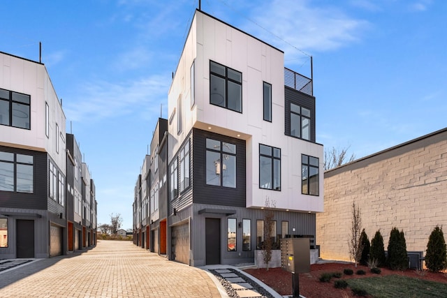 exterior space with a garage and driveway