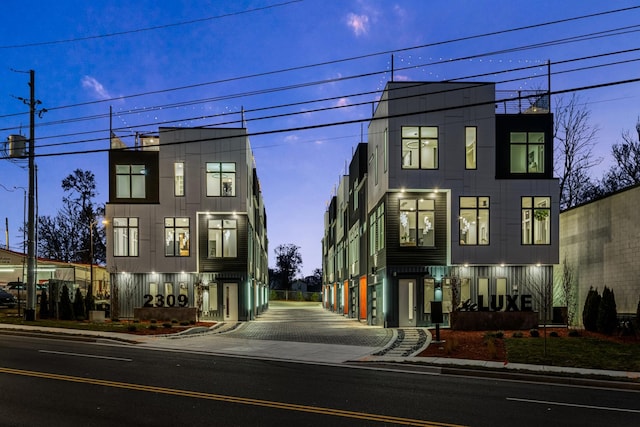 view of street featuring curbs and sidewalks