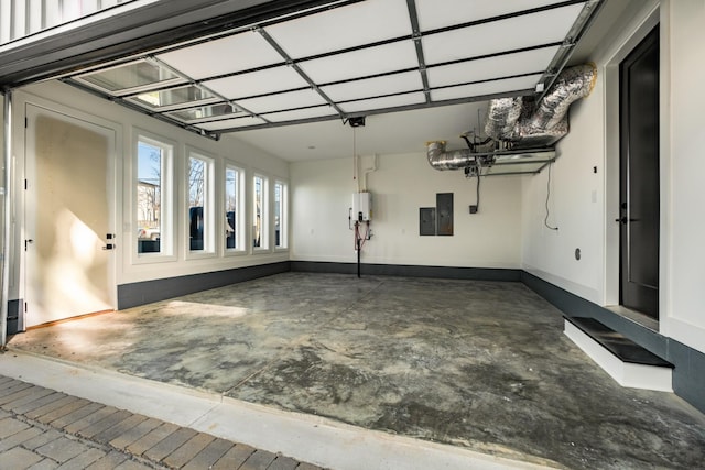 garage with water heater, electric panel, and baseboards