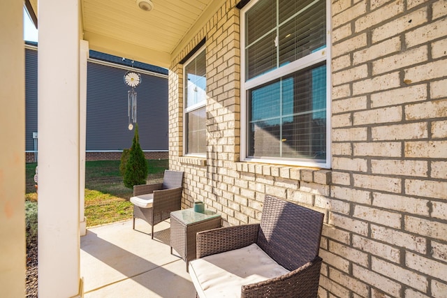 view of patio featuring a porch