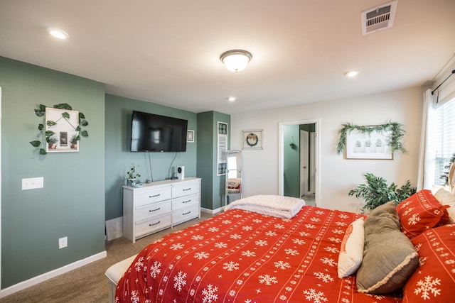 bedroom featuring carpet floors, recessed lighting, visible vents, and baseboards