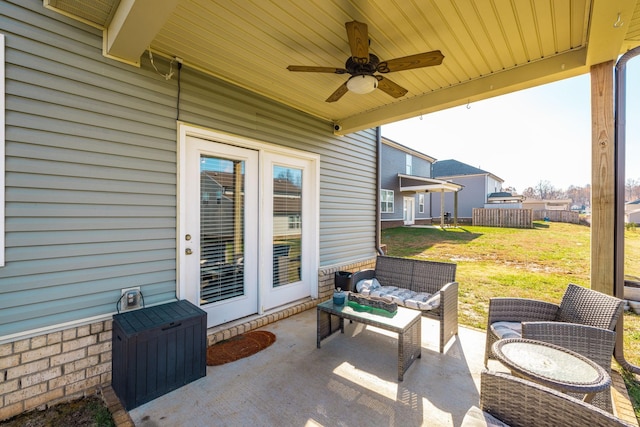 view of patio / terrace featuring a ceiling fan and fence