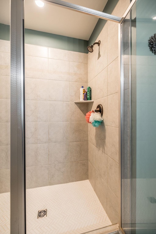 bathroom featuring a shower stall