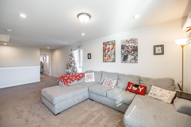 living area featuring carpet floors, baseboards, and recessed lighting