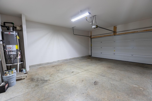 garage featuring water heater and a garage door opener