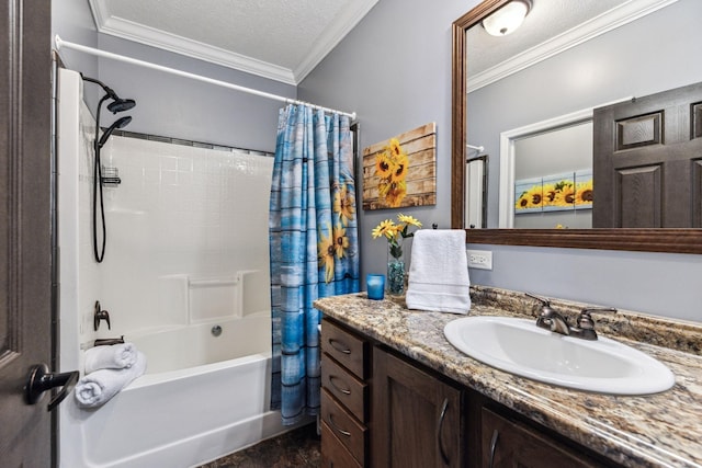 full bathroom featuring a textured ceiling, shower / bath combo with shower curtain, vanity, and crown molding