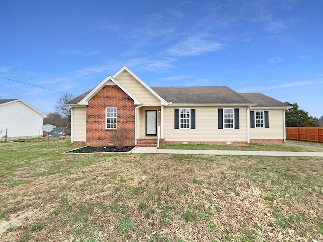 single story home with crawl space, fence, and a front yard