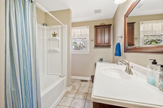 full bathroom with vanity, tile patterned flooring, visible vents, and baseboards