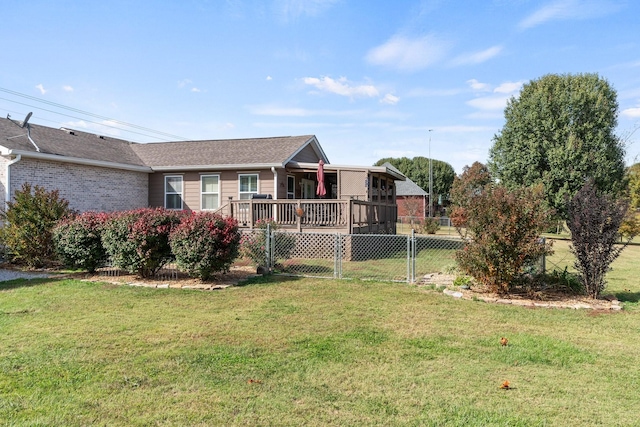 view of yard featuring fence and a wooden deck