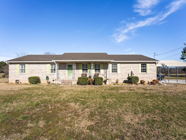 ranch-style home featuring brick siding, a shingled roof, covered porch, a front yard, and crawl space