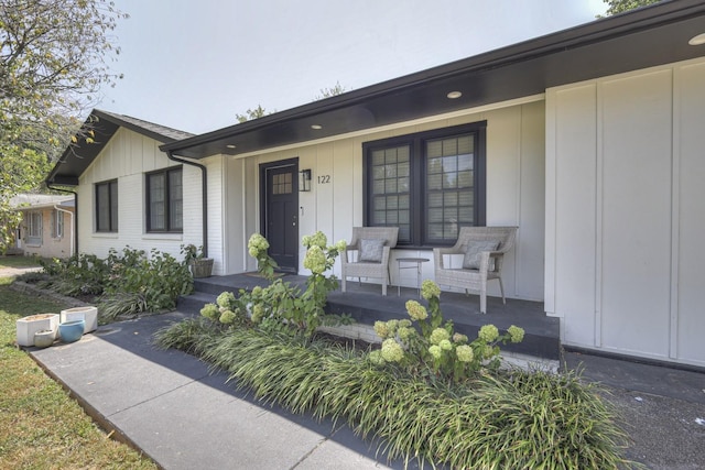 view of front facade with a porch and board and batten siding