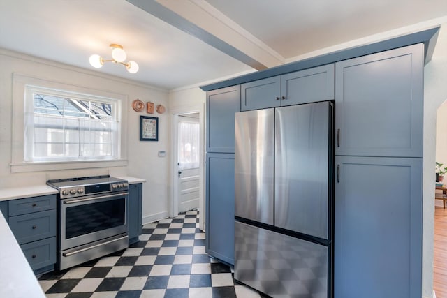 kitchen with dark floors, ornamental molding, blue cabinets, stainless steel appliances, and light countertops