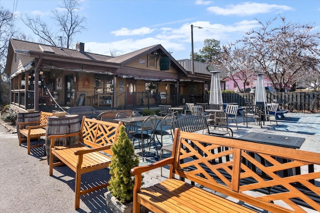 view of patio featuring fence