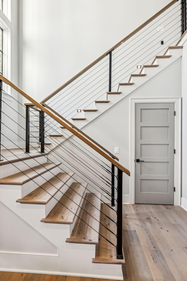 stairway with wood-type flooring