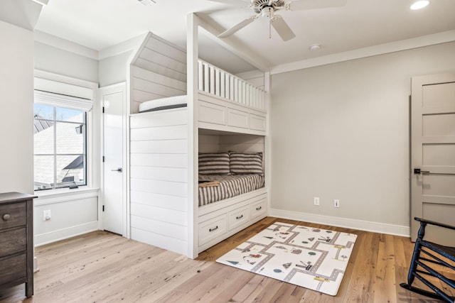 bedroom featuring light wood-style flooring, baseboards, a ceiling fan, and recessed lighting