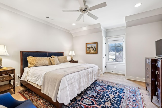 bedroom with recessed lighting, visible vents, light wood-style flooring, and baseboards