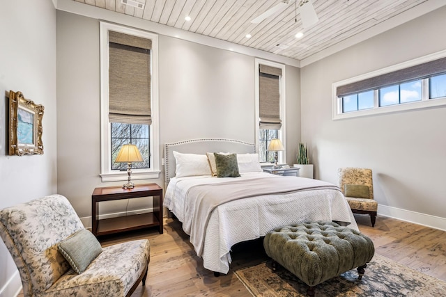 bedroom featuring wooden ceiling, light wood-style flooring, baseboards, and recessed lighting