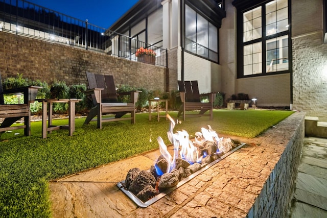 exterior space with an outdoor fire pit