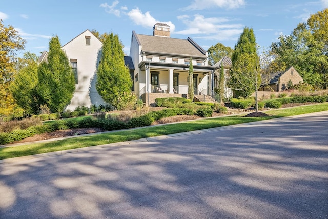 view of front of house with covered porch