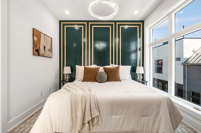 bedroom featuring recessed lighting and baseboards