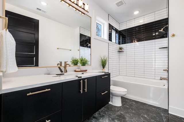 full bathroom featuring marble finish floor, visible vents, vanity, and toilet