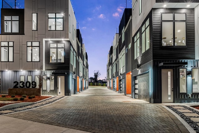 view of street with curbs