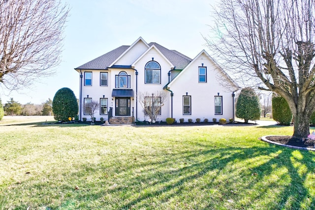 view of front of property with a front yard