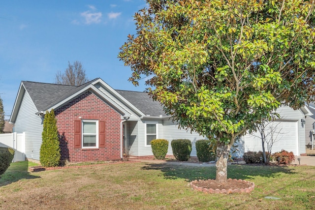 ranch-style home featuring an attached garage, brick siding, fence, roof with shingles, and a front yard