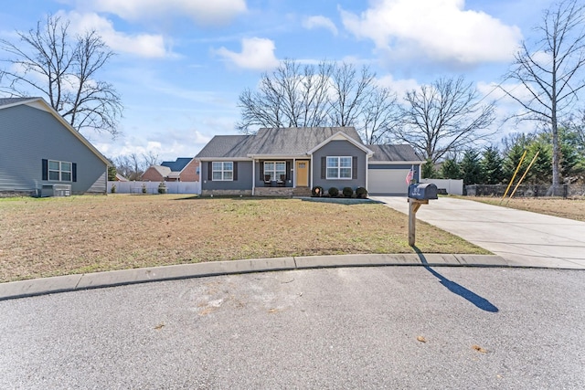 ranch-style home with a garage, concrete driveway, a front yard, and fence