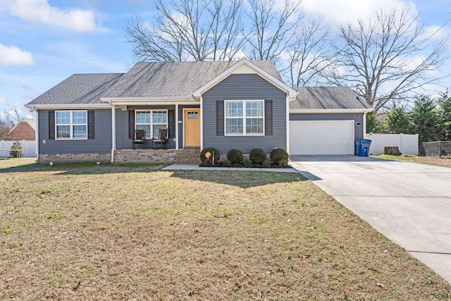 single story home with a garage, driveway, fence, and a front lawn