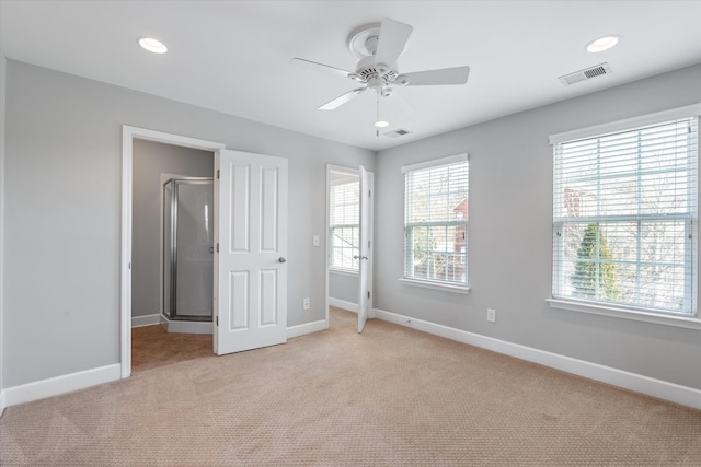 unfurnished bedroom with recessed lighting, visible vents, light carpet, and baseboards