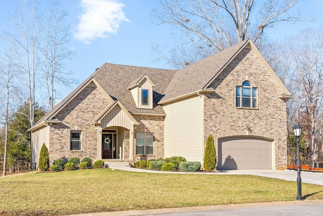 view of front of home featuring driveway, brick siding, a front lawn, and an attached garage