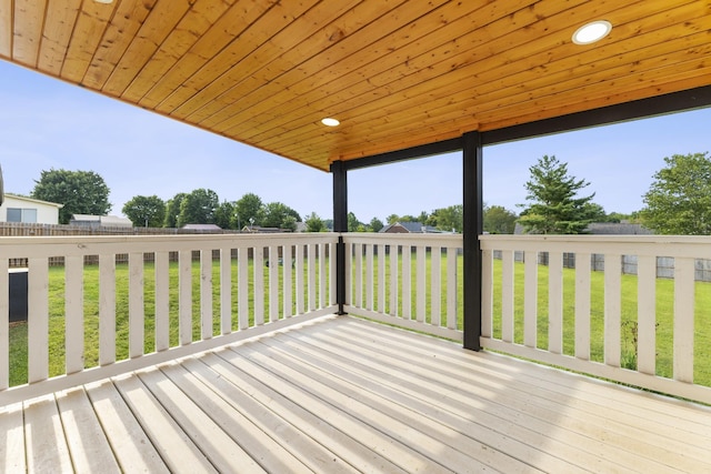 deck featuring a lawn