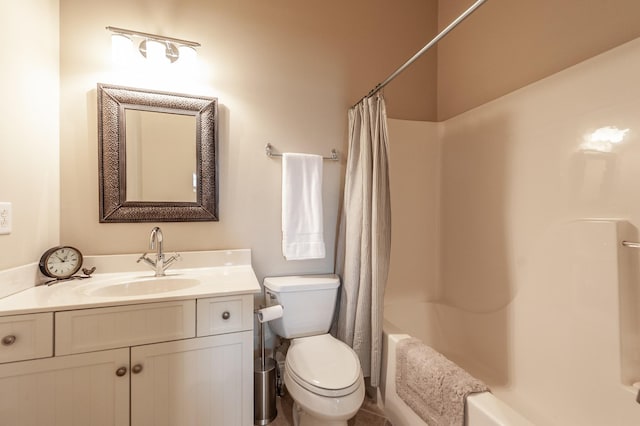 bathroom featuring shower / bath combination with curtain, vanity, and toilet