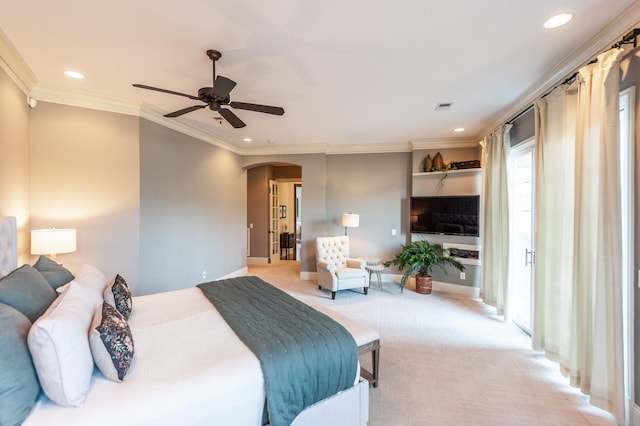 bedroom featuring light carpet, visible vents, arched walkways, crown molding, and recessed lighting