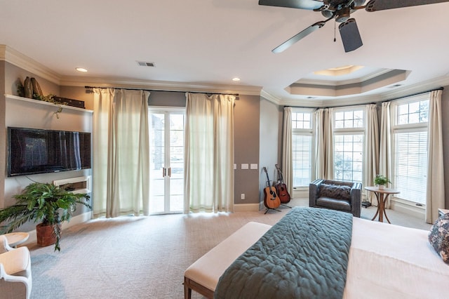 bedroom featuring carpet floors, visible vents, multiple windows, and ornamental molding