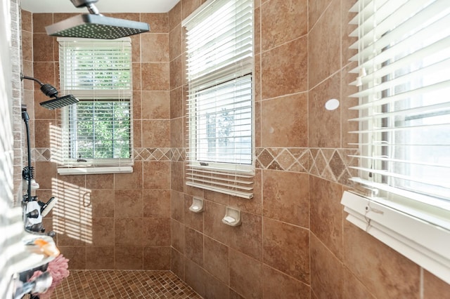 bathroom with a tile shower