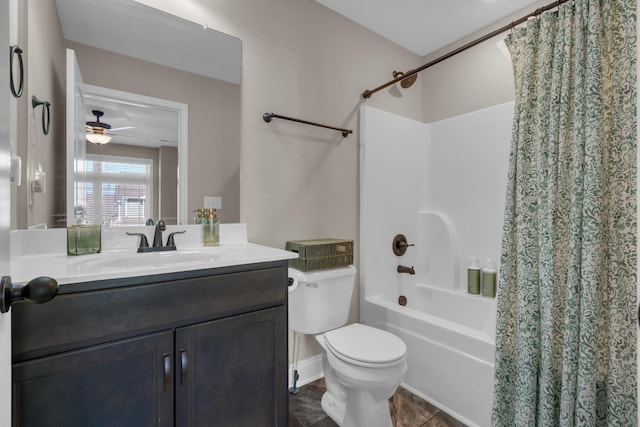 full bath featuring shower / tub combo, a ceiling fan, toilet, tile patterned flooring, and vanity