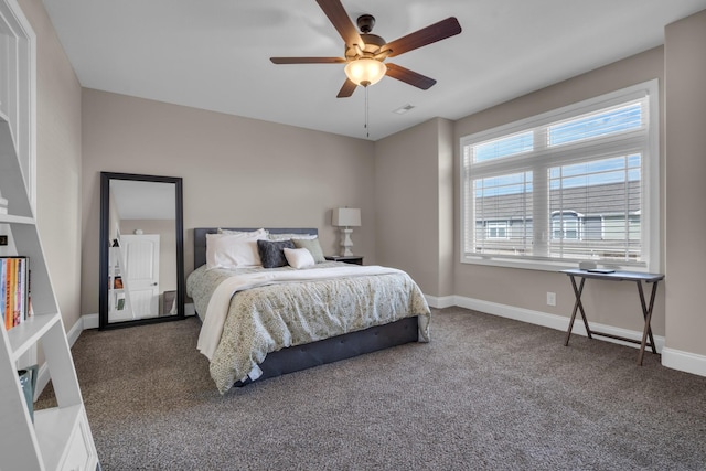 bedroom with carpet flooring, ceiling fan, visible vents, and baseboards