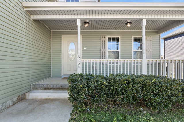 doorway to property with covered porch