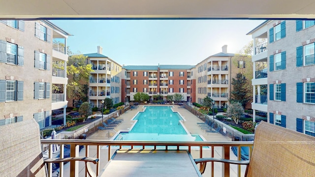 community pool with a patio