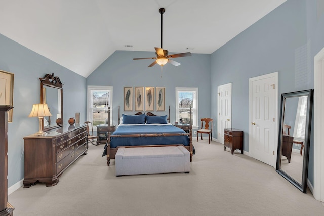 bedroom featuring light carpet, ceiling fan, high vaulted ceiling, and baseboards