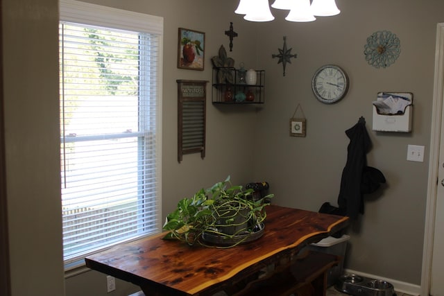 dining space with baseboards