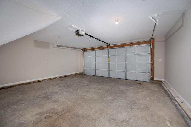 garage featuring baseboards and a garage door opener