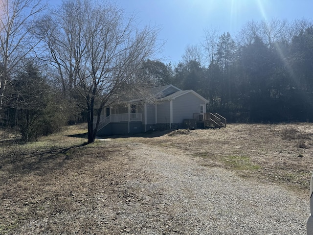 view of property exterior featuring driveway