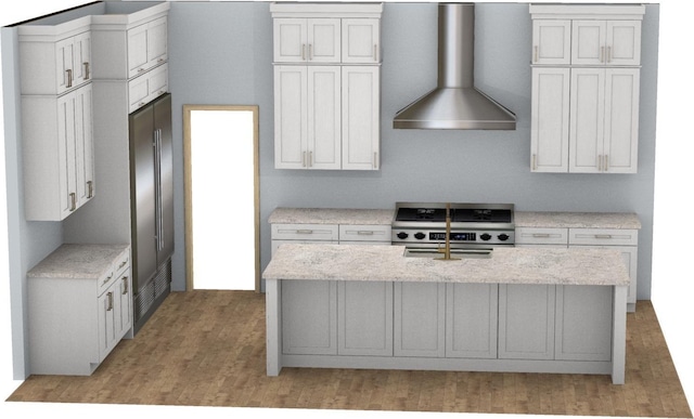 kitchen featuring wall chimney range hood, stainless steel range oven, and white cabinetry