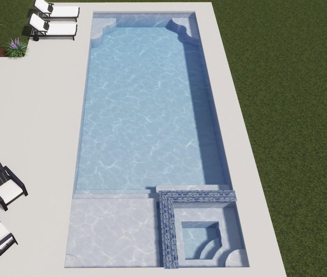 view of swimming pool with a pool with connected hot tub and a yard