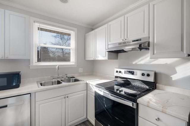 kitchen featuring appliances with stainless steel finishes, a sink, white cabinets, and under cabinet range hood